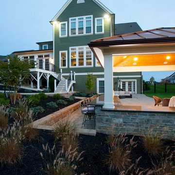 Design Builders Trex deck and outdoor kitchen with copper roof pavilion in Fulto