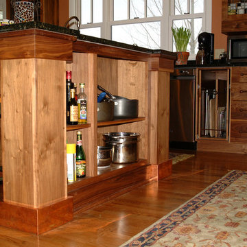 Copper Accented Craftsman Style Kitchen with Walnut Cabinets
