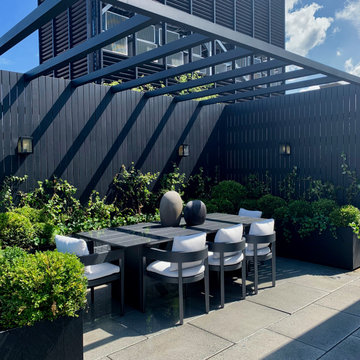 Urban Outdoor Dining Under Modern Powder Coated Aluminum Pergola