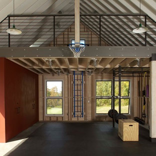 ニューヨークのエクレクティックスタイルのおしゃれなホームジム (コンクリートの床) の写真