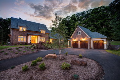 Elegant multicolored brick exterior home photo in Bridgeport with a shingle roof