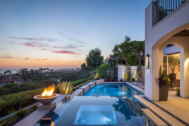 Inspiration for a contemporary pool remodel in Orange County