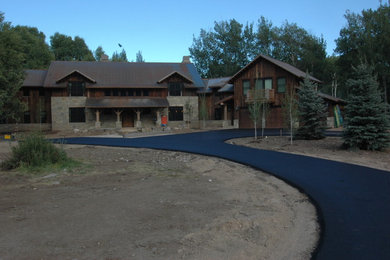 Rustic exterior home idea in Other