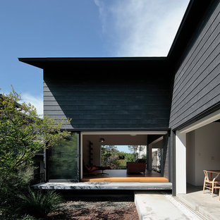 他の地域のコンテンポラリースタイルのおしゃれな中庭のテラス (日よけなし) の写真