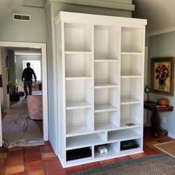 Custom built in bookcase and media case. - Bookcases