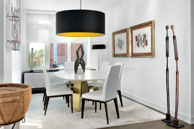 Contemporary dining room in Toronto with white walls, dark hardwood floors and brown floor.