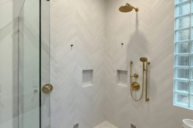 Walk-in shower - contemporary master ceramic tile walk-in shower idea in Dallas with gray walls and a hinged shower door