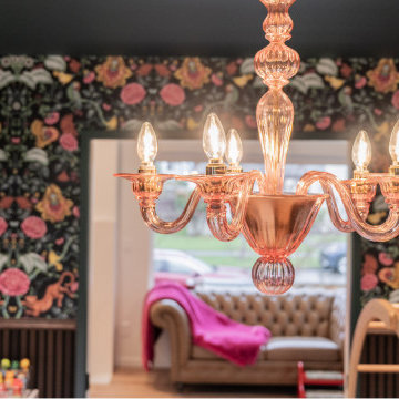 Statement Lighting: Ornate Glass Chandelier in Moody Madison Park Playroom