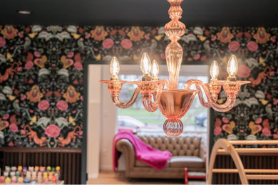 Example of a large eclectic gender-neutral light wood floor, beige floor and wallpaper playroom design in Seattle with multicolored walls