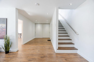 Staircase - mid-century modern staircase idea in Toronto