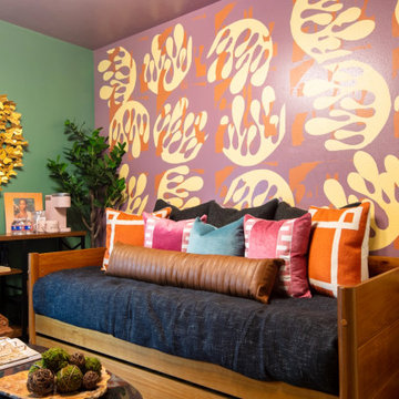 Bold Colorful Accent Wall in Tropical Guest Room