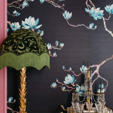 Eclectic dining space featuring gorgeous floral wallpaper