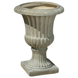 Traditional Outdoor Pots And Planters by GDFStudio