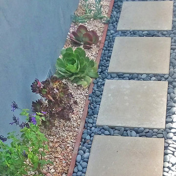 Concrete Paver Walkway with River Rocks