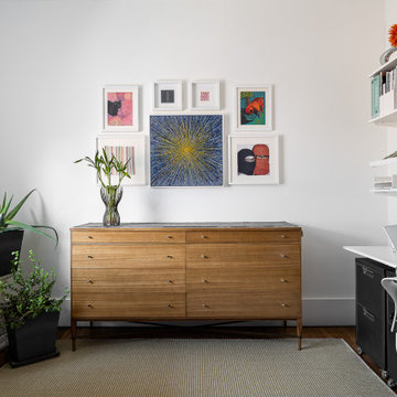 Eclectic White Home Office with Modular Wall Storage