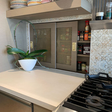 Custom Recessed spice niche with sliding doors