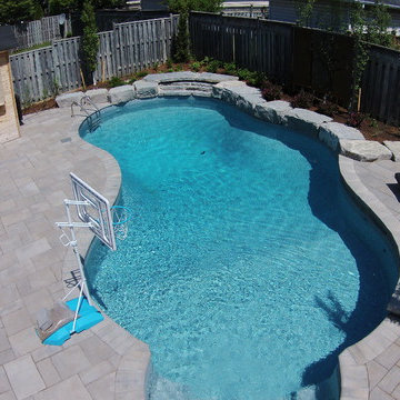 Freeform Pool and Backyard Retreat with Privacy Screens