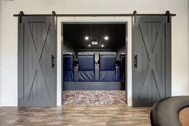 Example of an arts and crafts home theater design in Nashville