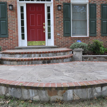 Flagstone with brick border walkway and garden walls
