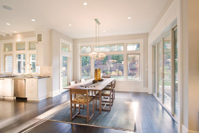 Dining room - mid-sized dark wood floor dining room idea in Minneapolis with beige walls