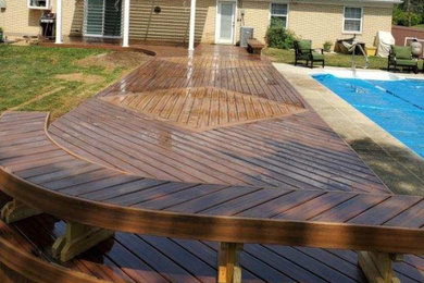 Huge trendy backyard deck photo in Cincinnati