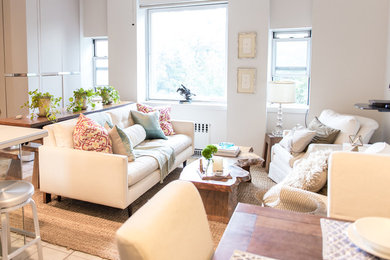 Example of a transitional living room design in New York