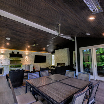 Screen Room with Stone Fireplace and Cooking Station