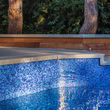 Iridescent Glass Tile Pool Seating Area