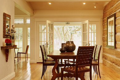 Example of a farmhouse dining room design in Denver