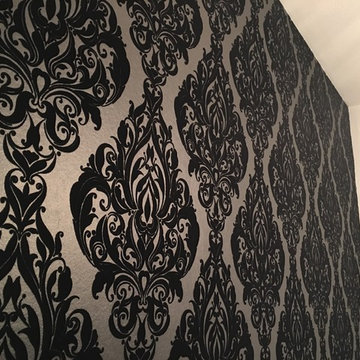 Before and after wallpapering accent walls