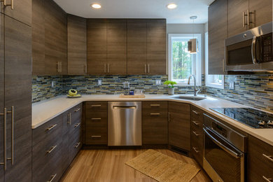 Photo of a transitional kitchen in Manchester.