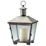 Cyan Design - Delta Lantern - The DeLighta Lantern make a unique addition to a mantel or outdoor patio area. Made from raw iron with glass paneling, this angled square lantern is minimal yet eye-catching. A small ring at the top makes for easy hanging. Display it alongside elements of industrial decor for a cohesive look.