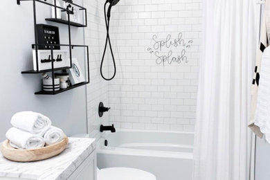 Inspiration for a mid-sized contemporary kids' bathroom remodel in Los Angeles with a built-in vanity