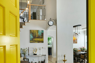 Inspiration for a huge transitional light wood floor and yellow floor entryway remodel in San Francisco with gray walls and a yellow front door