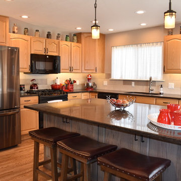 Eclectic kitchen preserving some of the cabinets