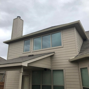 Buda, TX Seamless Gutter Install, Beige Split Level Home