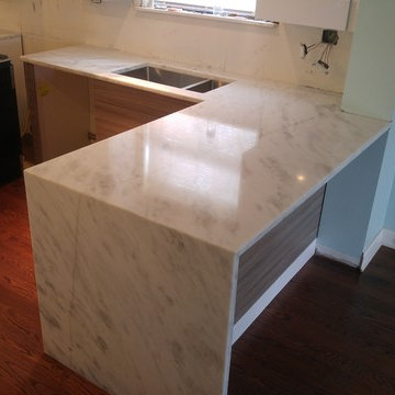 3 cm super white quartzite with book matched waterfall edge
