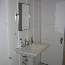 door hidden in panel