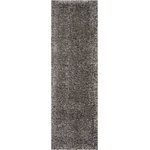 Nourison - Nourison Luxe Shag 2'2" x 7'6" Charcoal Shag Indoor Area Rug - This exceptionally plush 2-inch-deep flokati shag rug from the Nourison Luxe Shag Collection has the look and feel of luxuriously soft sheepskin, and makes a perfect addition to any casual room setting. Luxurious texture and deep grey color for a warm, soothing accent.