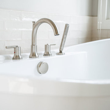 Freestanding Tub with Brushed Chrome Tub Filler