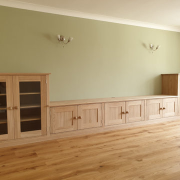 Oak lounge TV unit with display end cupboards