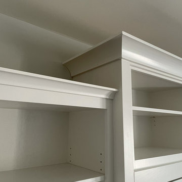 Custom Built Vertical Murphy Bed with Side and Upper Shelving, In White Finish