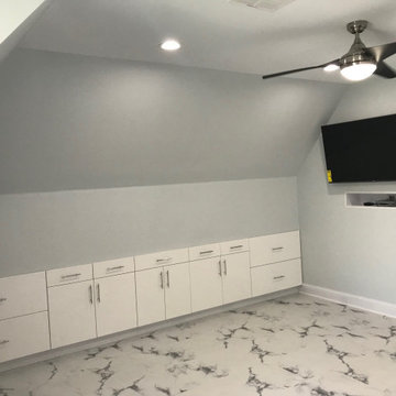 Attic Bedroom with built-in furniture to maximize space