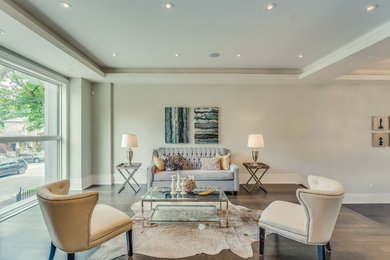 Living room - mid-sized contemporary formal and open concept living room idea in Toronto with white walls, no fireplace and no tv
