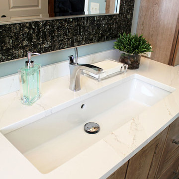 Transitional Masterbath with large sink, custom tiled shower and sitting area