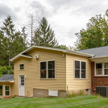 Cheerful Multi Level Rear Addition to Expand Kitchen, Mudroom & Sunroom in Oakt