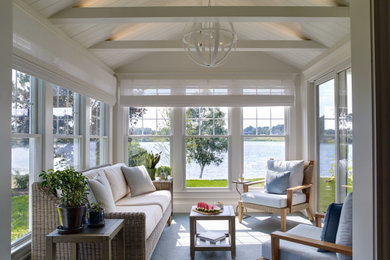 Sunroom - coastal gray floor sunroom idea in Portland Maine with a standard ceiling