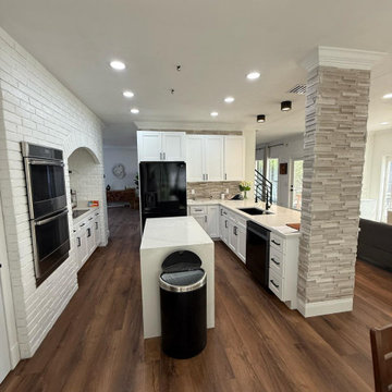 **Complete Kitchen, Flooring, Complete Stair Case and Trim