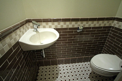 Design ideas for an arts and crafts powder room in Seattle.