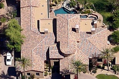 Huge mediterranean exterior home idea in Phoenix
